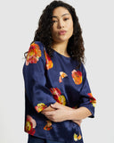 Model wears Silk Smock Top in Nour