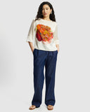 Model wears Silk Smock Top in Diya