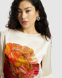 Model wears Silk Smock Top in Diya