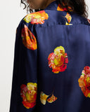 Model wears long sleeve silk shirt in Nour