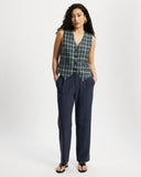 Model wears a Navy, green and blue checked button down Waistcoat