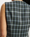 Model wears a Navy, green and blue checked button down Waistcoat