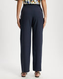 Model wears Suit pants in Navy