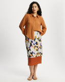 Model wears Contrast Slip Midi Skirt with watercolour and contrast silk orange