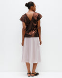 Model wears Pearl Bias Cut Skirt