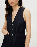 Model wears Denim Daydream Reversible Vest