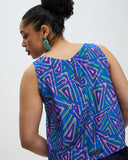 Model wears Fariba Silk Shell Top
