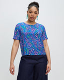 Model wears Fariba Silk Tee