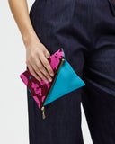 Model holds Foldover Purse - Storyteller