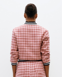 Model wears Fondant Pink Checked Aviator