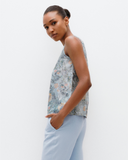 Model wears Kai Shell Top in Aqua