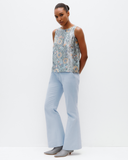 Model wears Kai Shell Top in Aqua