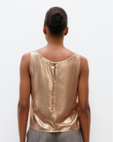 Model wears liquid Gold Scoop Camisole