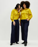 Models wear Marigold Bishop Sleeve Top