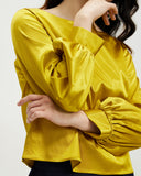 Model wears Marigold Bishop Sleeve Top