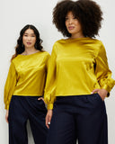 Models wear Marigold Bishop Sleeve Top