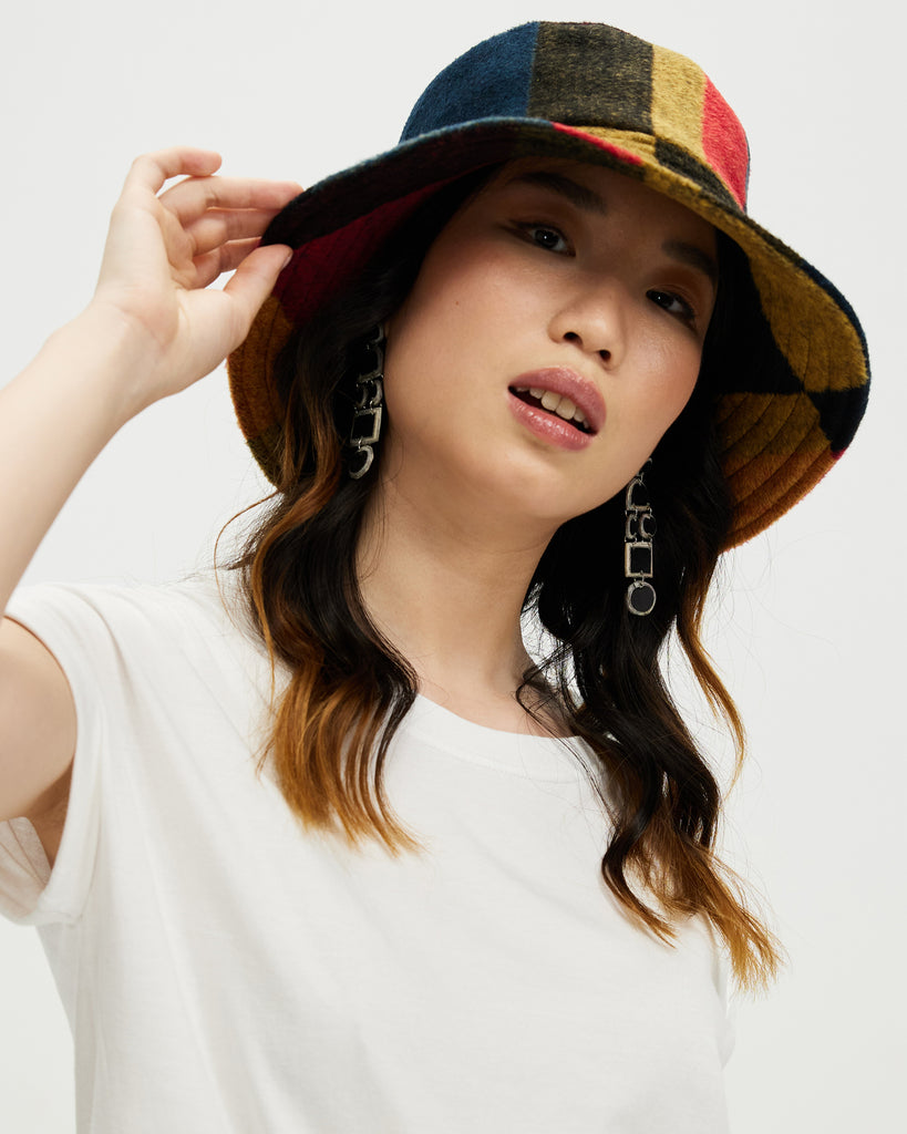 Model wears Plaid Patchwork Bucket Hat