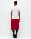 Model wears Ruby Red Bias Cut Skirt