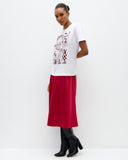 Model wears The Social Outfit Sewing Room Graphic Tee.