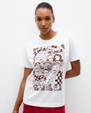 Model wears The Social Outfit Sewing Room Graphic Tee.