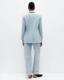 Model wears Suit Pants in Elemental Denim.