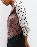 Model wears Bishop Sleeve Top in Timeless Polka