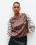 Model wears Bishop Sleeve Top in Timeless Polka