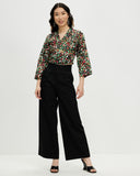 Model wears Wild Meadow Wrap Top