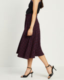 Model wears Magenta Tweed Flared Skirt