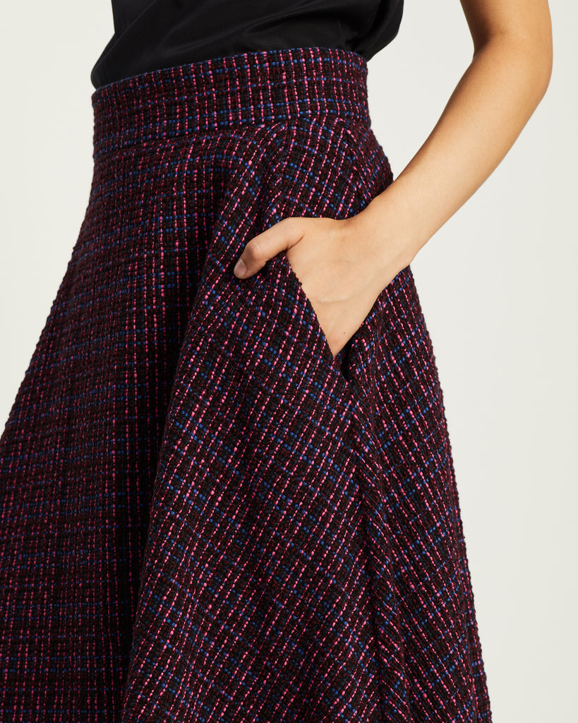 Model wears Magenta Tweed Flared Skirt
