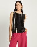 Model wears Black and cream Shell Top