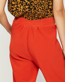 Model wears Scorching Orange Straight Leg Pant