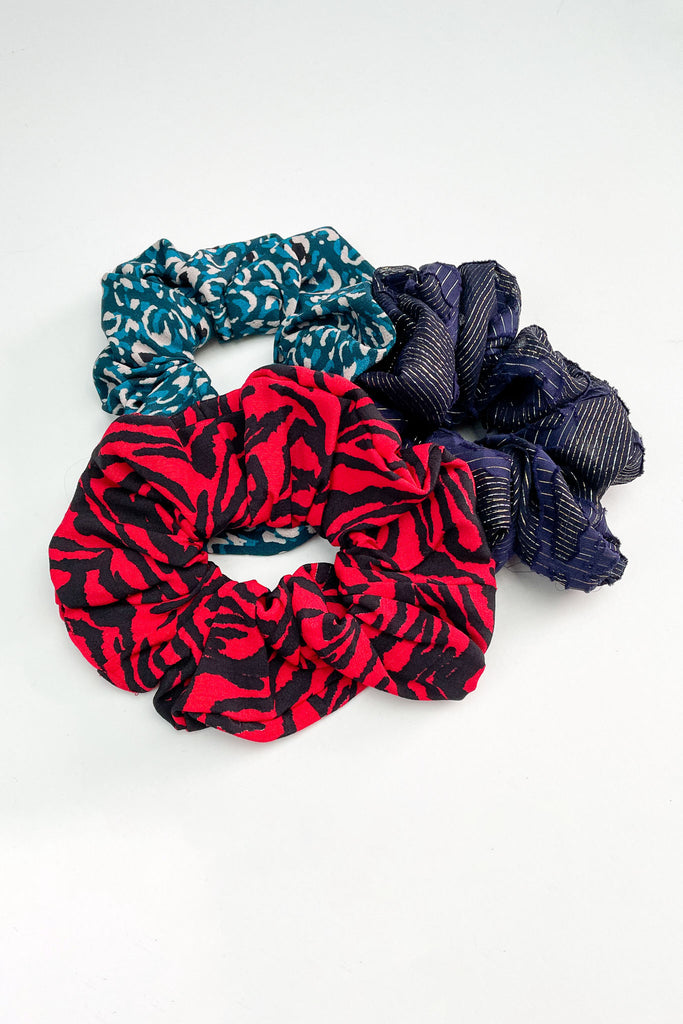 a set of 3 the social outfit scrunchies in our unique prints against a white backdrop