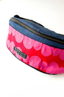 friendship beads funky bum bag with blue denim contrast fabric against white backdrop