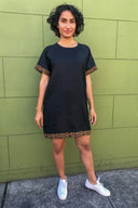 Mariam wears our leopard linen sports raglan mini dress