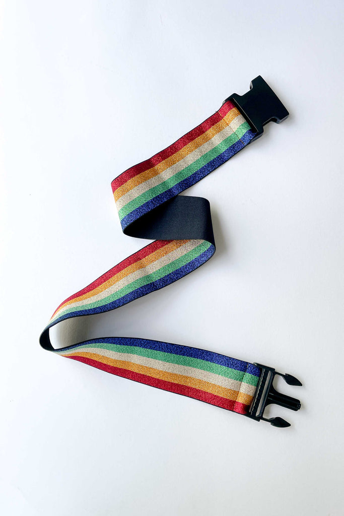 rainbow wide belt with black buckle against white backdrop