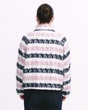 Person wearing a striped jacket with a white background