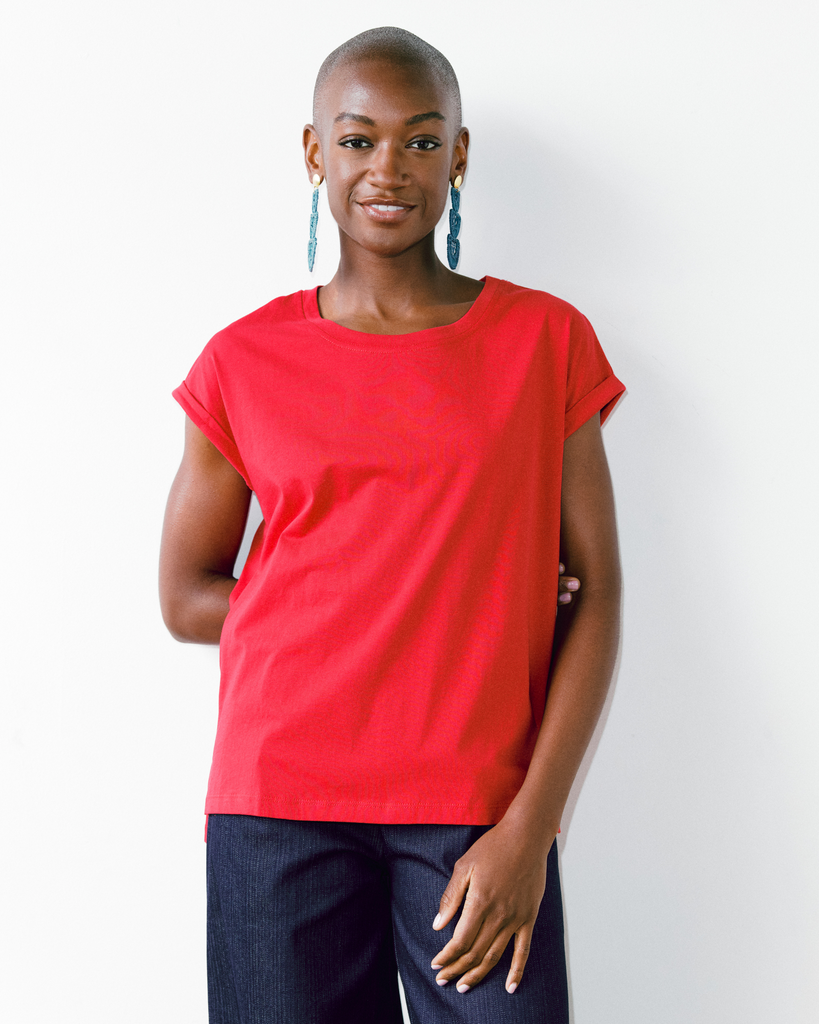 Model wears Dorsu Poppy Red Rolled Sleeve Top 