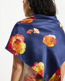 Model wears Silk Square Scarf in Nour over sholders
