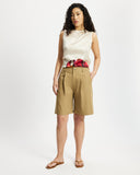 Model wears Bermuda Shorts in tan 