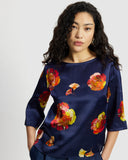 Model wears Silk Smock Top in Nour