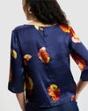 Model wears Silk Smock Top in Nour