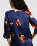 Model wears Silk Smock Top in Nour
