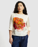 Model wears Silk Smock Top in Diya