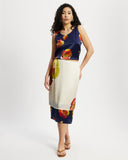 Model wears silk contrast midi skirt in Diya and Nour