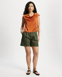 Model wears Cowl Draped Top in sunset 