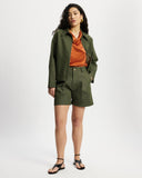 Khaki Denim cropped Bermuda shorts worn by a person on a white background