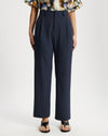 Model wears Suit pants in Navy