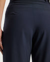 Model wears Suit pants in Navy