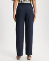 Model wears Suit pants in Navy